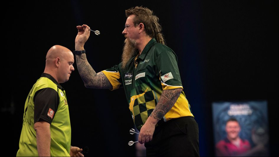 Simon Whitlock in action against MVG (Picture: PDC/Lawrence Lustig)