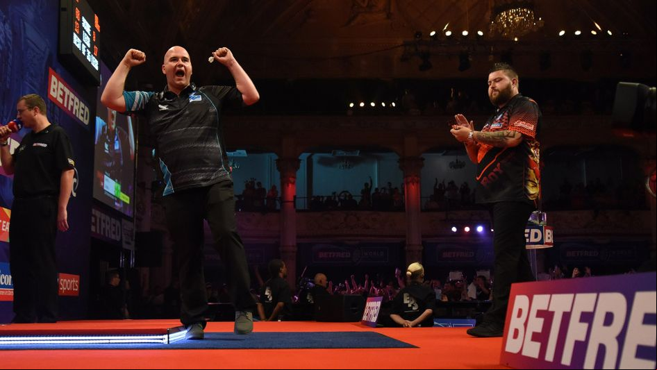 The moment Rob Cross won the World Matchplay final against Michael Smith (Picture: Lawrence Lustig/PDC)