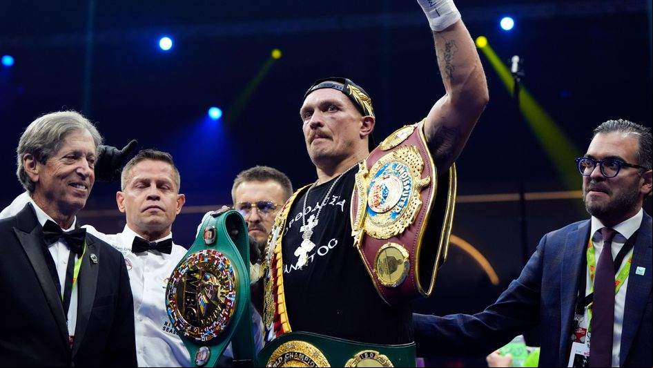 Oleksandr Usyk celebrates