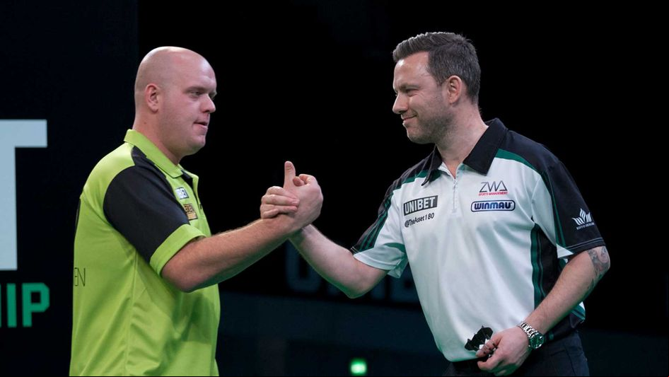 Michael van Gerwen and Paul Nicholson shake hands (Picture: Kelly Deckers/PDC)