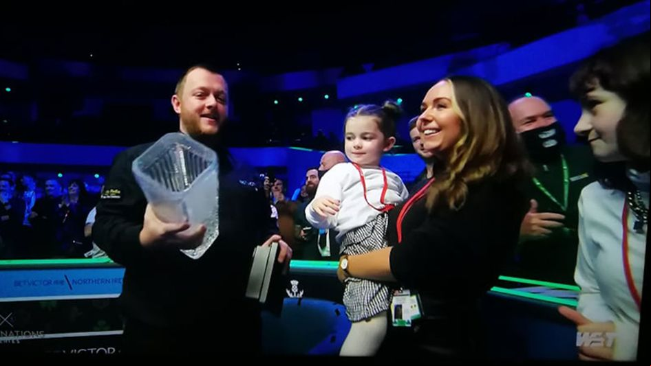 Mark Allen shares a memorable moment with his family