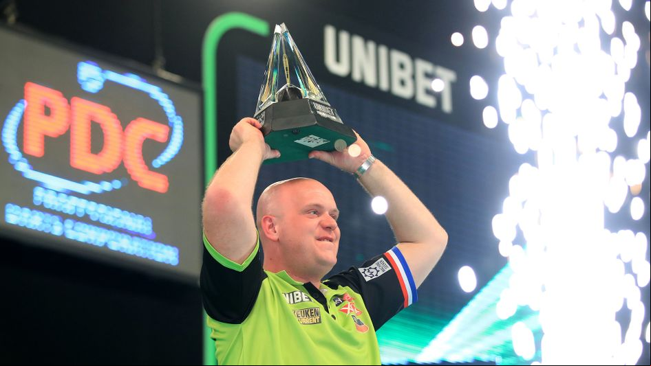 Michael van Gerwen lifts the Premier League Darts title for a fifth time
