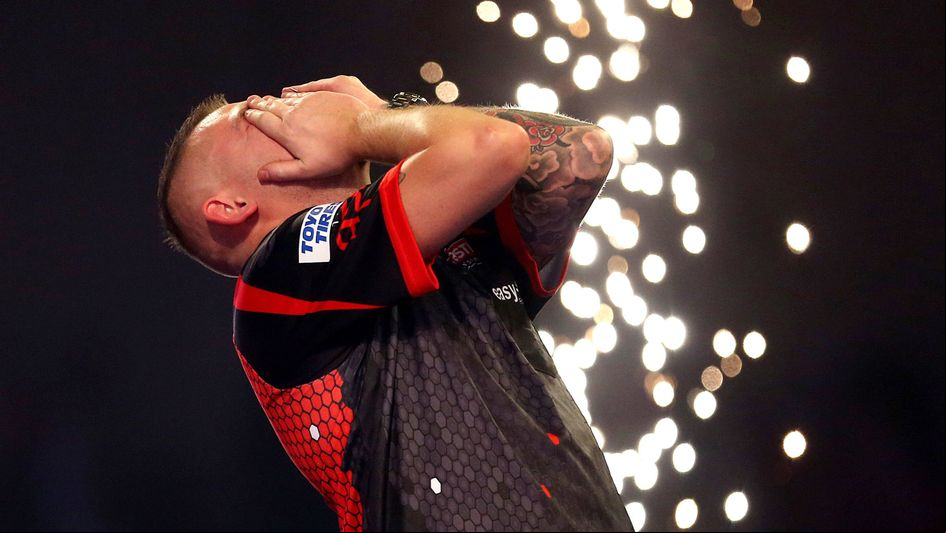 Nathan Aspinall reacts to reaching the semi-finals